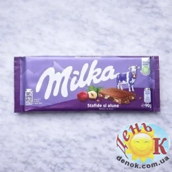 Молочный шоколад с изюмом и фундуком Milka Молочный шоколад с изюмом и фундуком Milka